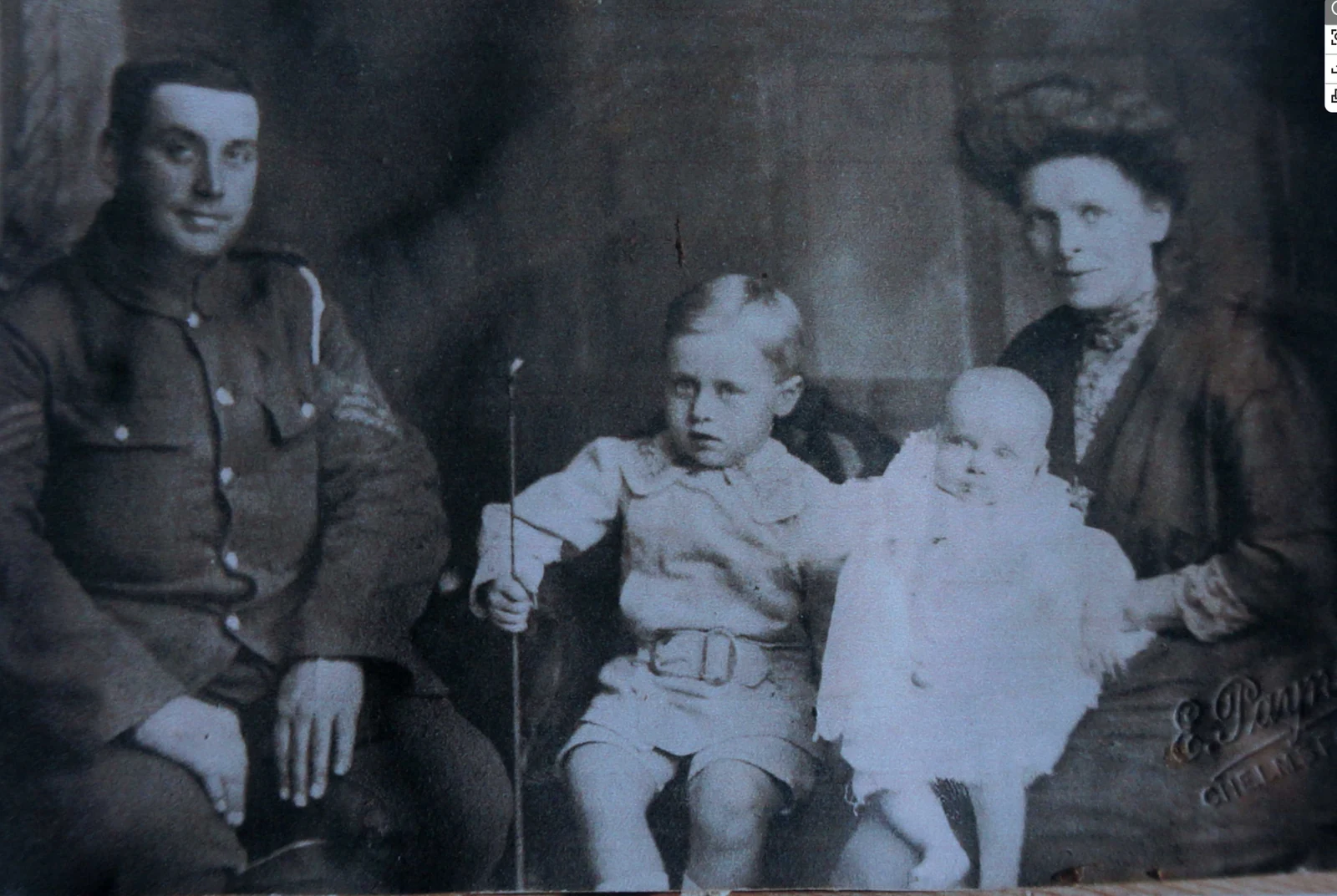 Family photograph of Walter John Smith in uniform with Amelia and two children