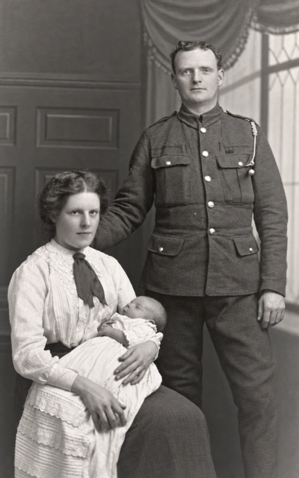 Enhanced family photograph of Samuel Battersby standing beside Janey holding Norman